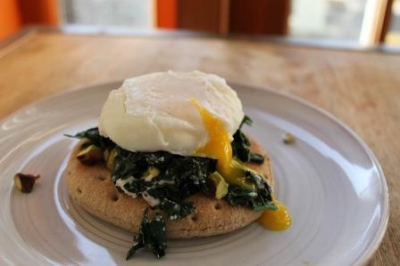 Breakfast Sandwich with Goat Cheese, Pistachios, Kale and Poached Egg