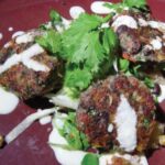 Shrimp with black bean cakes with lime crema