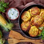 Finished product photo for savory corn pancakes with yogurt dipping sauce.