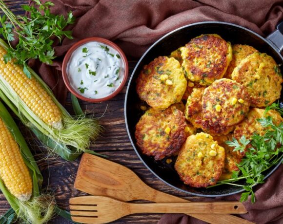 Finished product photo for savory corn pancakes with yogurt dipping sauce.